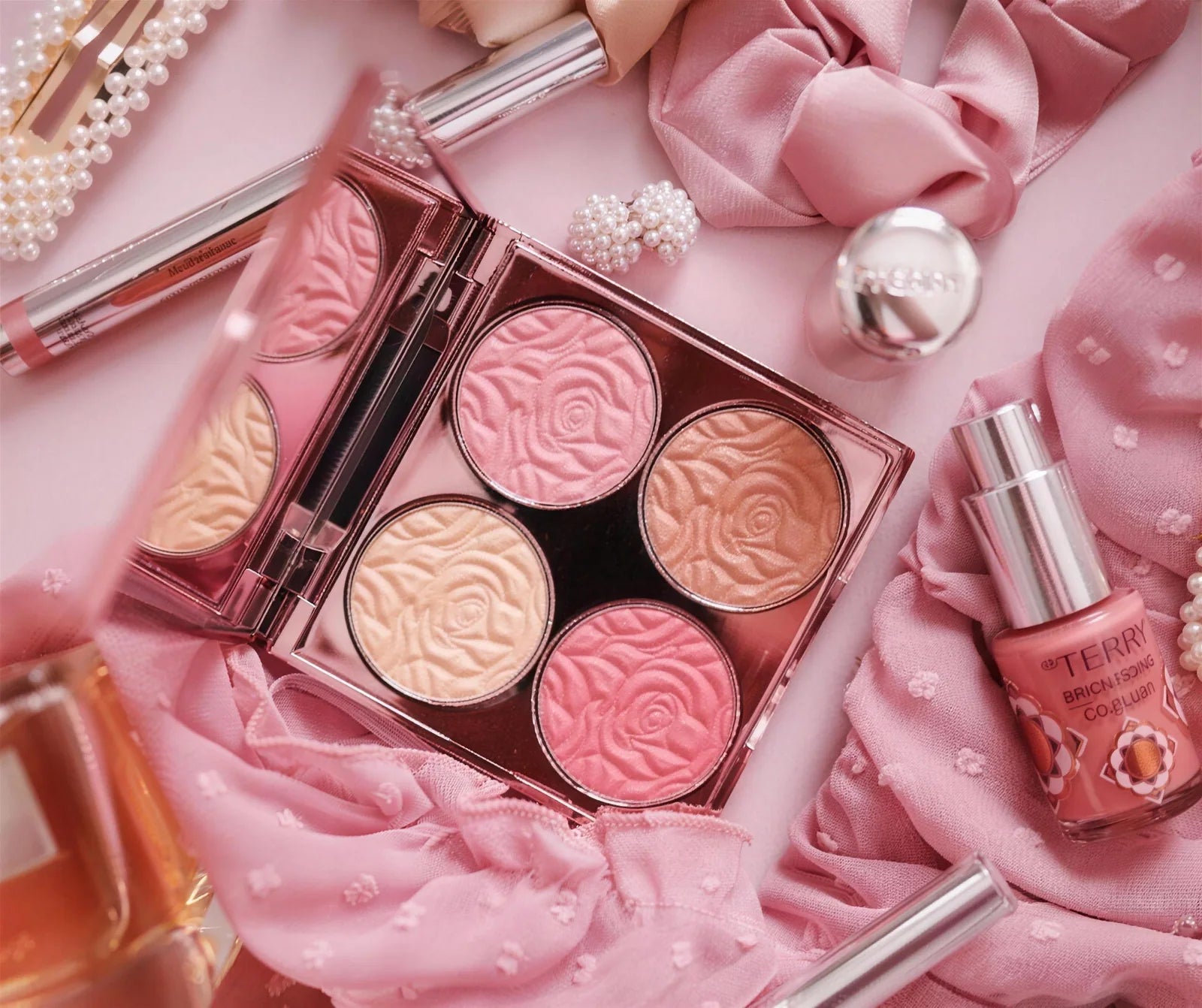 Pink beauty products and makeup